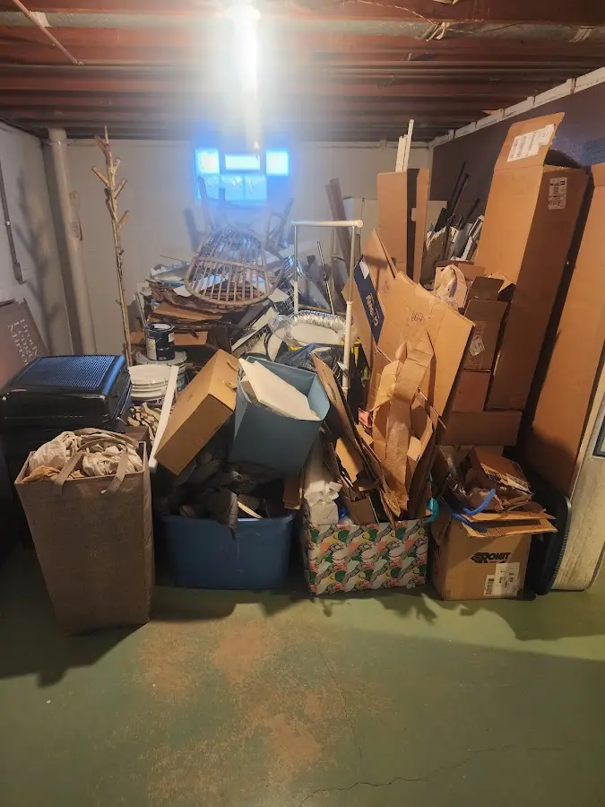 Roll-off dumpster container at job site for 4 Yard Dumpster Rental in Hope Mills